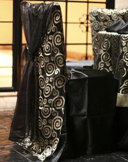 Black and gold custom chair jacket with matching overlay.